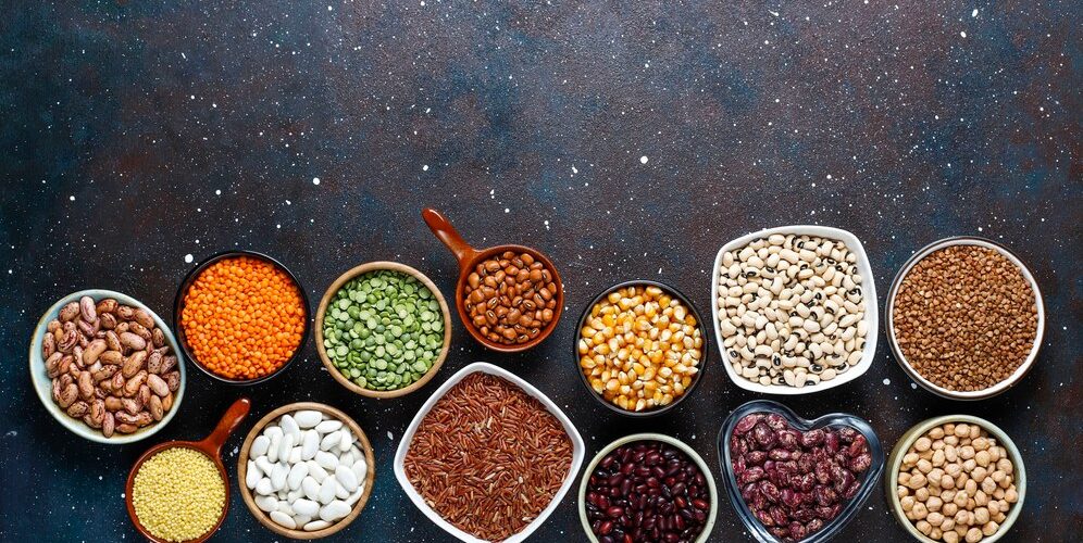 legumes-beans-assortment-different-bowls-light-stone-background-top-view-healthy-vegan-protein-food_114579-10736